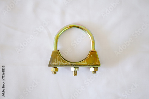 U shape bolt clamp isolated on white, for pipe, glass, or any equipment. Galvanized steel wire rope clips. U shaped bolt used to fix loose end of a loop back to the wire rope or connect two wire rope