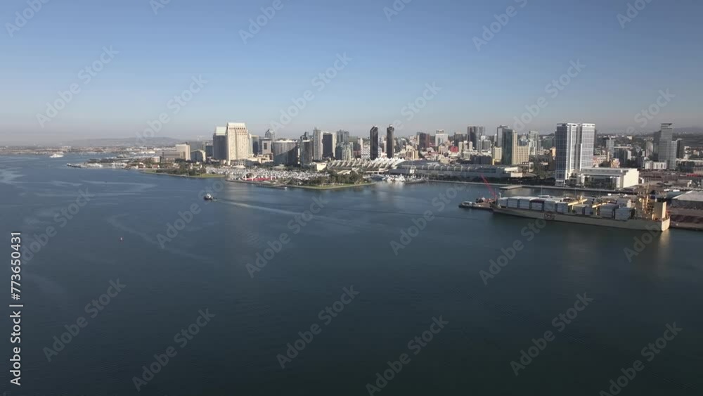 Aerial of Downtown San Diego skyline over Coronado Bay during clear blue day Aerial of Downtown San Diego skyline over Coronado Bay during clear blue day