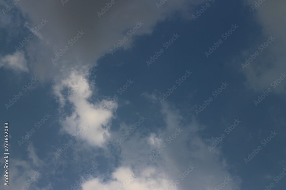 Fototapeta premium Natural daylight and white clouds floating on blue sky.