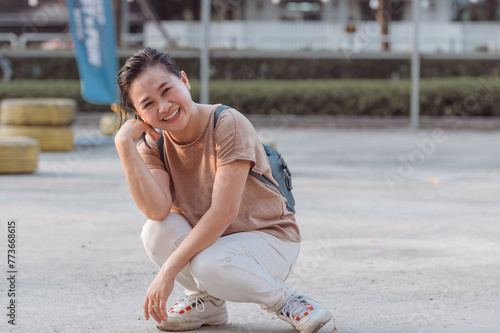 Happy Asian Woman look into camera and smile 