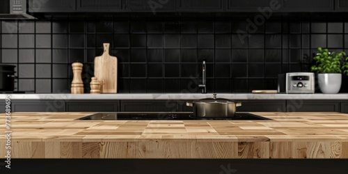 A modern kitchen featuring a wooden countertop located next to a stove top oven