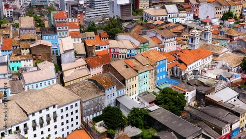 Aerial view of the houses and buildings on the Pelourinho neigbourhood and the sea at background, Salvador, Bahia, Brazil photo