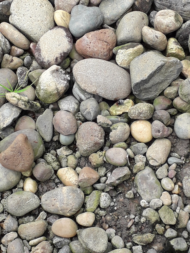 abstract Textured background with round pebble stones. Vacation holiday recreation on beach concept. High quality photo. Fragment with a texture of rock. abstract Textured background with round pebble stones. Vacation holiday recreation on beach concept. High quality photo. Fragment with a texture of rock.