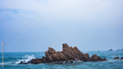 Huangdao District, Qingdao City, Shandong Province-Sprays on the Golden Beach photo