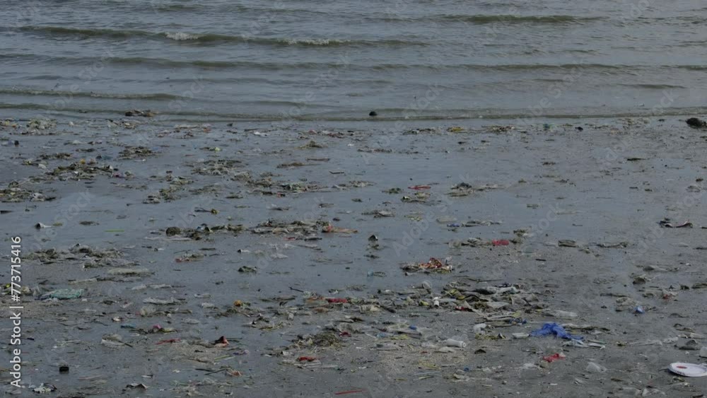 Beach debris, plastic cups and plastic bags. Marine debris is one of the world's major environmental problems
Beach debris, plastic cups and plastic bags. Marine debris is one of the world's major environmental problems