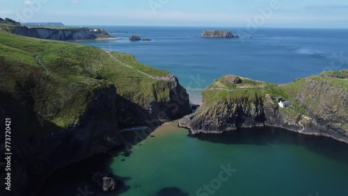 The video shows a shot of The Rope Bridge, recorded by drone in North Ireland. Part 4 photo