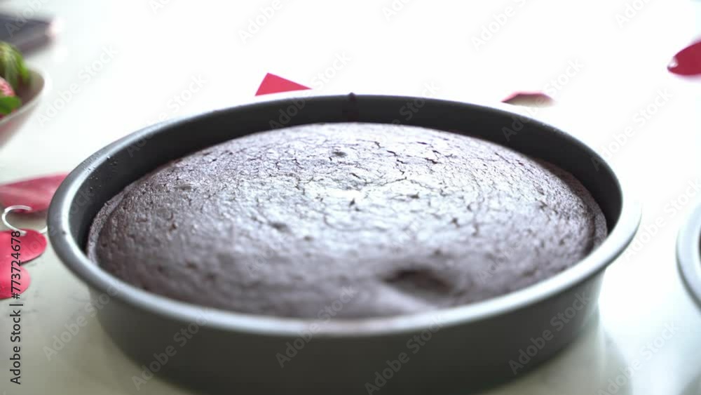 Slow pan across table of two freshly baked chocolate cakes vegan chocolate cake eggless plant based dairy free Slow pan across table of two freshly baked chocolate cakes vegan chocolate cake eggless plant based dairy free