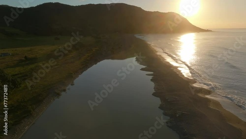 Lagoon and sunset in Raukokore River, Raukokore, Bay of Plenty, New Zealand. photo