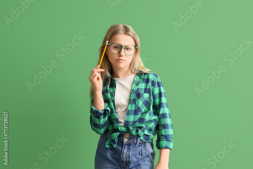 Thoughtful little girl in e...