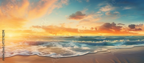 Sunset over the ocean with vibrant colors casting a warm glow, waves gently crashing on the sandy beach