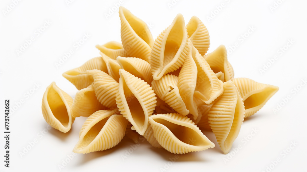Heap pasta horns on a white surface Heap pasta horns on a white surface