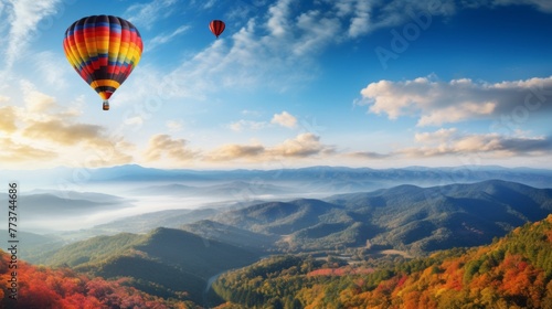 A hot air balloon is flying over a beautiful mountain range