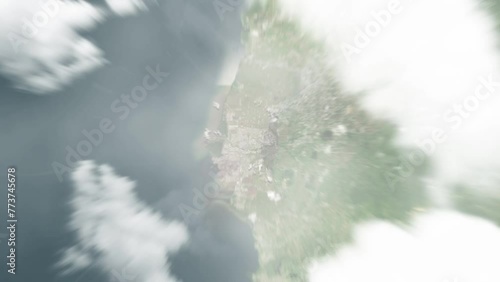 Earth zoom in from space to Couva, Trinidad and Tobago. Followed by zoom out through clouds and atmosphere into space. Satellite view. Travel intro. Images from NASA photo