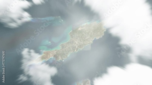 Earth zoom in from space to The Valley, Anguilla. Followed by zoom out through clouds and atmosphere into space. Satellite view. Travel intro. Images from NASA photo