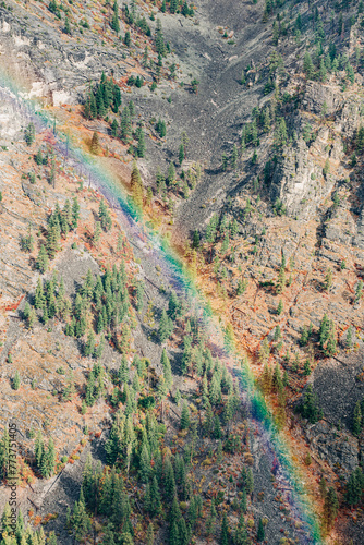 Rainbow over Blodgett Canyon on sunny fall day photo