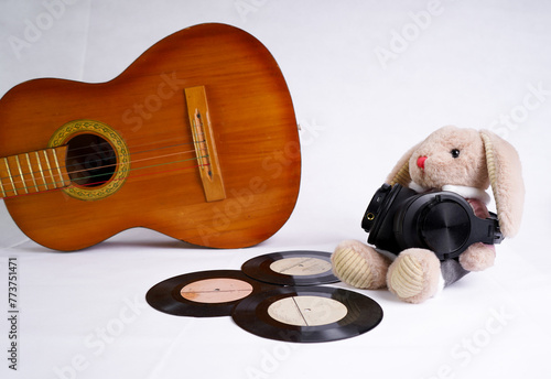 Plush bunny toy DJ with guitar and vinyl discs