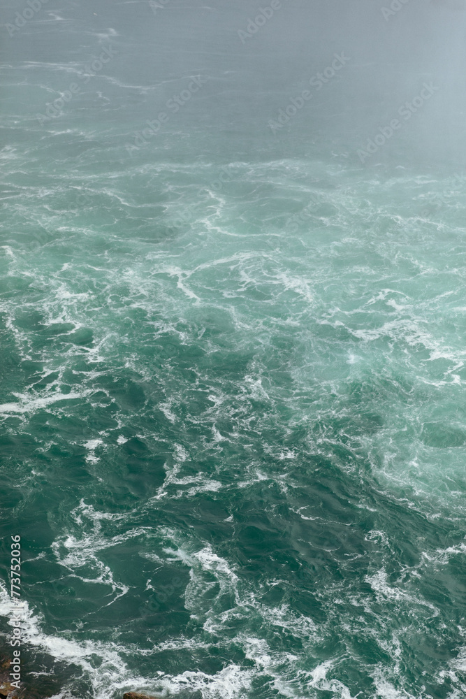 Overhead view of waves on sea shore