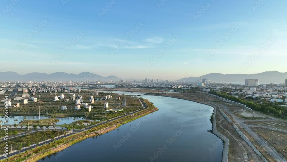New residential property development zone outside of Da Nang, Vietnam in Southeast Asia - Aerial drone video flying forwards with rise up New residential property development zone outside of Da Nang, Vietnam in Southeast Asia - Aerial drone video flying forwards with rise up