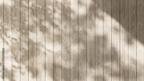Outdoor wood plank fence wall in dappled sunlight, leaf shadow for exterior design decoration, garden, fashion, beauty product background 3D © Sue Tansirimas