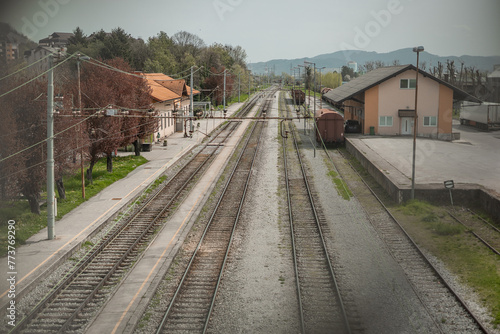 Wallpaper Mural Train station of Krsko seen from the railway overpass, looking towards south. Some empty tracks seen, station before renovation. Torontodigital.ca