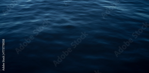 Blue water ocean surface, calm dark sea background photo