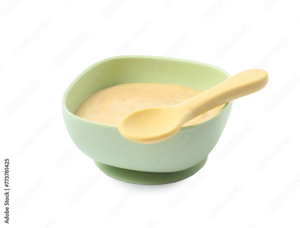Tasty baby food in bowl and spoon isolated on white Tasty baby food in bowl and spoon isolated on white