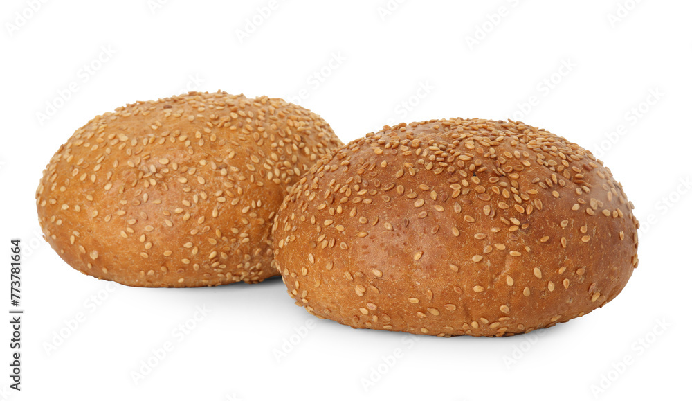Two fresh hamburger buns with sesame seeds isolated on white Two fresh hamburger buns with sesame seeds isolated on white