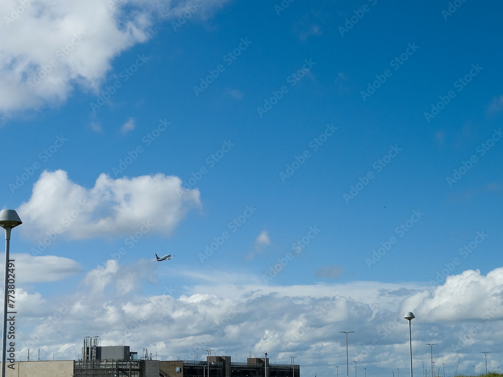 White fluffy cumulus clouds in the summer sky, natural clouds background White fluffy cumulus clouds in the summer sky, natural clouds background