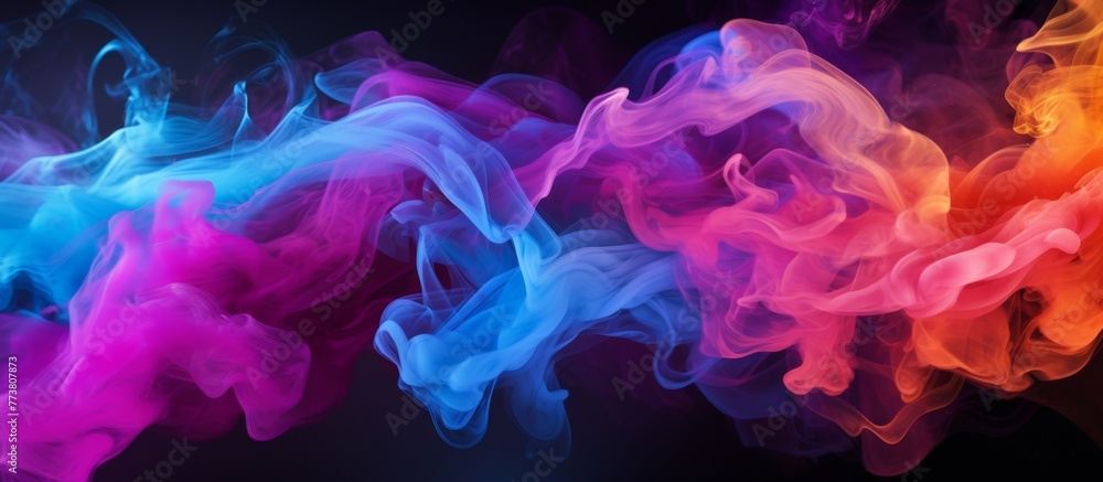 A mesmerizing close-up image of a vivid and swirling smoke pattern against a black backdrop A mesmerizing close-up image of a vivid and swirling smoke pattern against a black backdrop