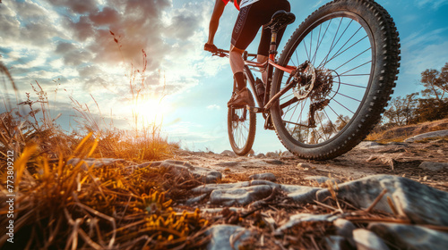 A person is riding a mountain bike © standret