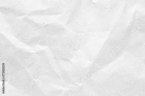 Abstract white crumpled and creased recycle craft paper texture background photo