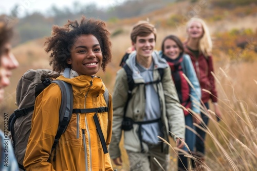 Group of young friends hiking in countryside. Multiracial happy people travelling in nature, Generative AI © Mr Traveller