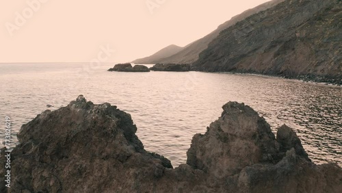AERIAL VIEW OF THE COAST AT SUNSET