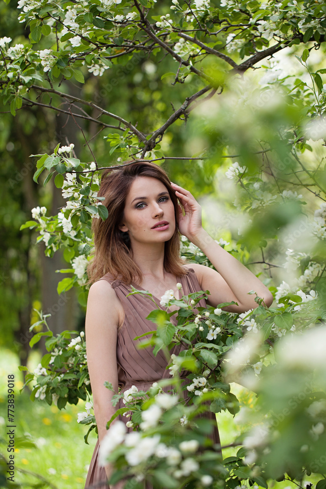 Charming spring woman enjoying nature outdoor, fashion beauty portrait Charming spring woman enjoying nature outdoor, fashion beauty portrait