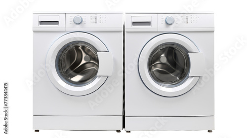 Two washing machines stand side by side in a laundry room, ready to tackle a mountain of dirty clothes