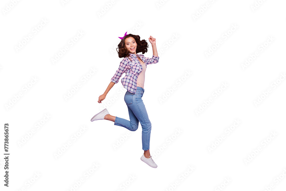 Full length size beautiful attractive pretty lady with her style brunette wave curly hair she run marathon isolated on vivid purple background in headband checkered shirt denim casual jeans