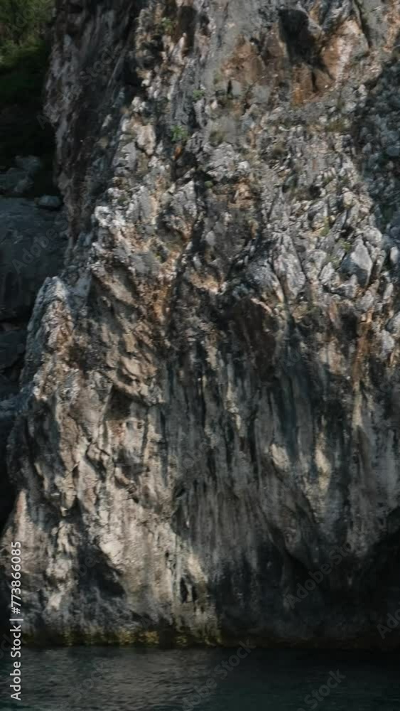 boat tour near Corfu island attractions deep clean clear water mountains natural spring passing boat people. tourists and travelers boat tour near Corfu island attractions deep clean clear water mountains natural spring passing boat people. tourists and travelers