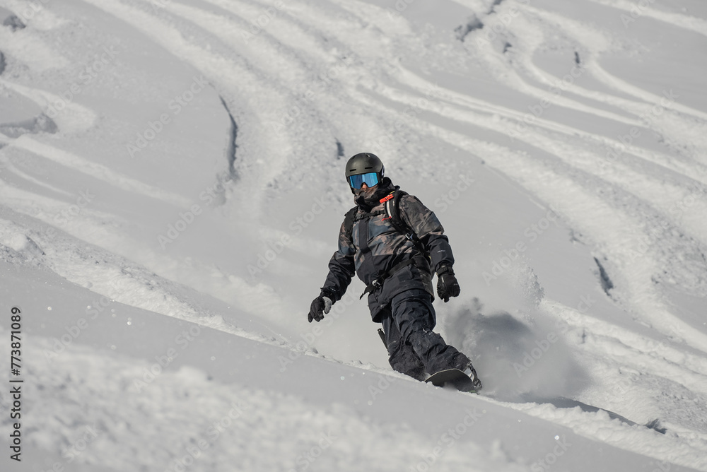 Ski, Snowboard freeride i deep powder snow. Gudauri Georgia Caucasus resort. Freeride in Caucasus mountains. Freeride snowboarding in winter. Heliboarding freeride. Riding in powder on snowborad.