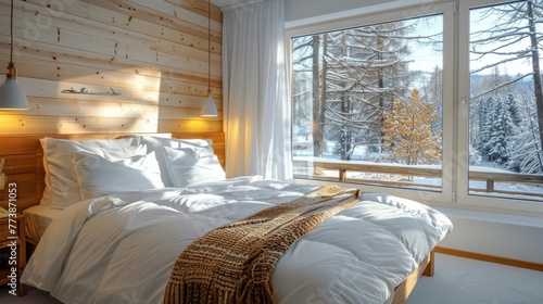 Bed With White Comforter and Pillows by Window