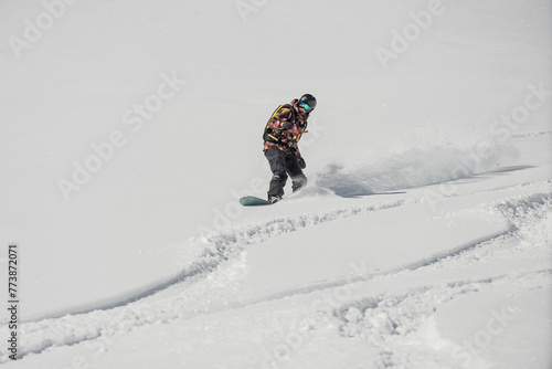 Ski, Snowboard freeride i deep powder snow. Gudauri Georgia Caucasus resort. Freeride in Caucasus mountains. Freeride snowboarding in winter. Heliboarding freeride. Riding in powder on snowborad.