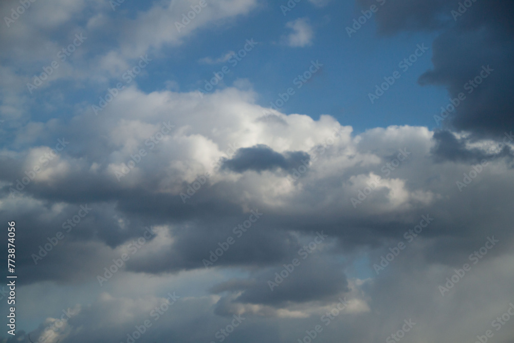 Cloudy sky background. texture of clouds and blue sky. Photo of the real sky