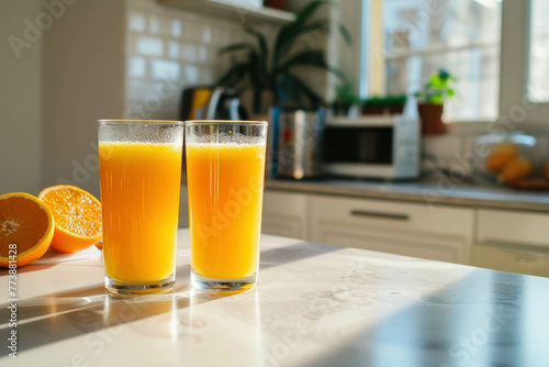 Kickstart your day with a healthy breakfast of sweet orange juice and drinking glasses on a white kitchen table. A refreshing and appetizing scene brought to life with AI generative photography. photo