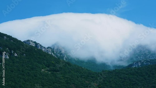 Time lapse of the Foehn effect on Mount Candina in Liendo. Liendo Valley, Eastern Coastal Mountain, Cantabrian Sea, Cantabria, Spain, Europe photo