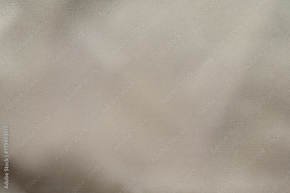 Fototapeta premium Background - simple light beige rayon fabric from above