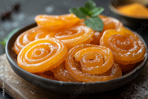 photo of Jalebi (sweet, crispy, and spiral-shaped dessert)