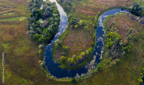 Aerial Tranquility: Observing the Rippling River's Sinuous Route