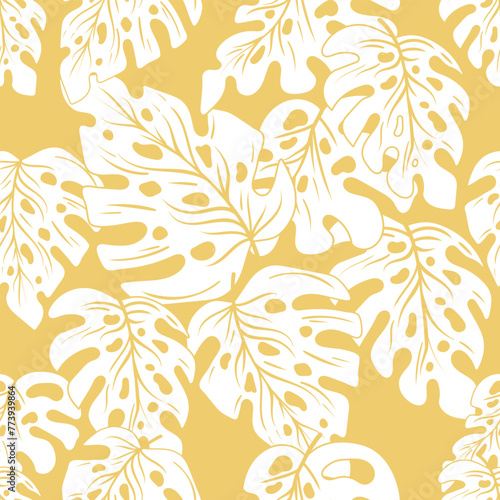 Monstera leaves seamless pattern isolated in yellow background. Botanical summer leaves background.