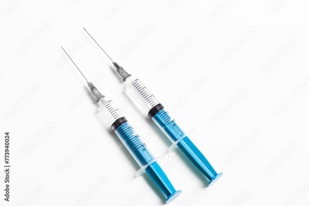 Disposable plastic syringe prepared for injection and vaccination in the hospital Disposable plastic syringe prepared for injection and vaccination in the hospital