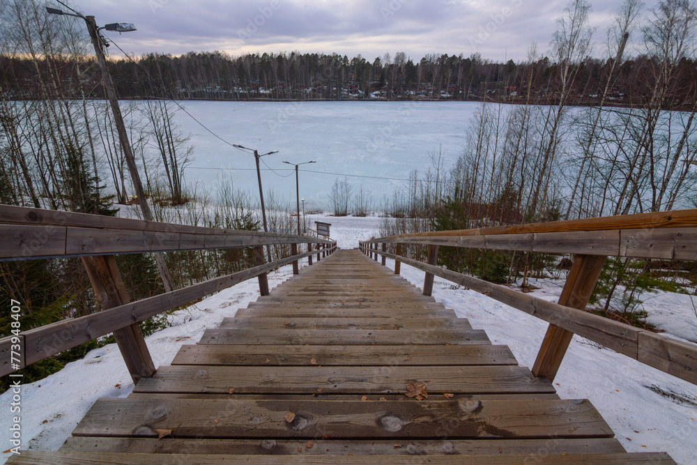 Wooden trail in park in winter. Joutseno, Finland
