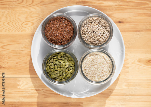 Seed cycling for hormone balance, to balance pre and post menopausal hormones. Flax, pumpkin, sesame and sunflower seeds. Balancing hormones - estrogen and progesterone. Woman health, fertility photo